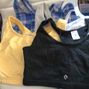 4 sports bras pullover one blue and gray plaid one light gray, yellow, & black